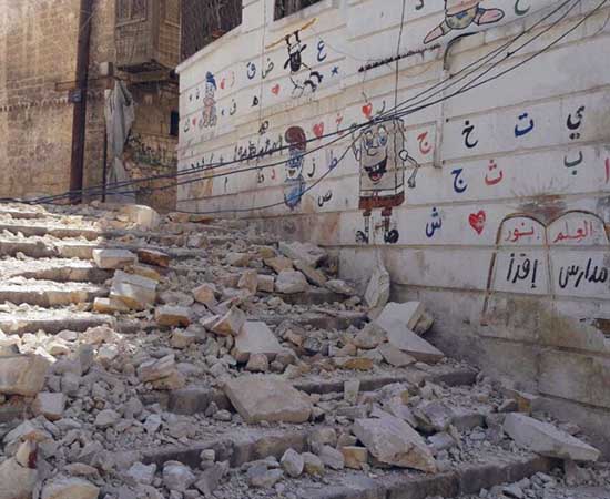 Eine im Krieg zerstörte Straße in Syrien. © Save the Children 